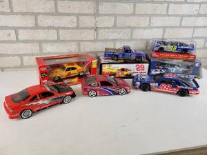 lot 752 image: Lot of (8) Nascar Diecast and More - Most are 124 Scale