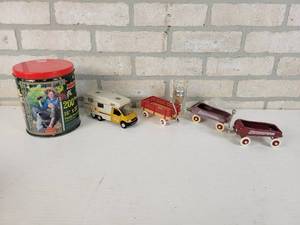 lot 889 image: Coca-Cola 200 Piece Puzzle in a Tin, Toy Cars and More