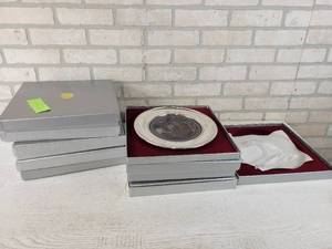 lot 914 image: (9) Vintage U.S. Historical Society Pewter & Stained Glass Plates - Christmas, Easter and More