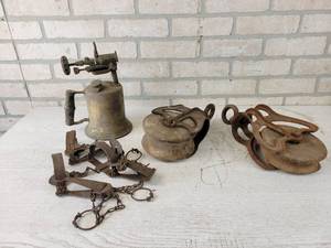 lot 767 image: Vintage Brass Torch, Traps and (2) Cast Iron & Wood Pulleys