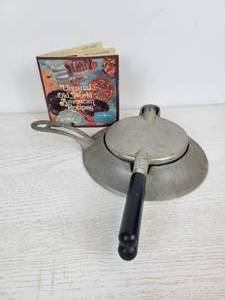 lot 1021 image: Vintage Nordic Ware Aluminum Stove-Top Krumkake Iron and Recipe Book