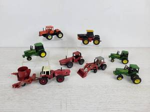 lot 1043 image: Lot of Collectible ERTL Tractors - Allis-Chalmers, International, John Deere, Massey Ferguson, and More