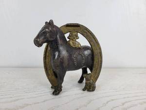 lot 1047 image: Vintage Cast Iron Still Buster Brown, Tige, Horse, and Horseshoe Coin Bank