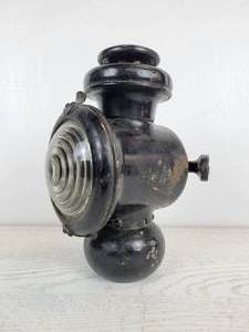 lot 1056 image: Ford Model T Kerosene Cowl Lamp with Bracket