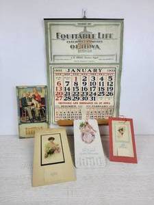 lot 1063 image: Antique Calendars including 1935 J.R. Higgs New Ulm, MN, 1915 Kibbe Chocolates, 1912 The Delta Pickle Company, and More