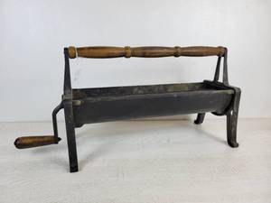 lot 1088 image: Vintage Newspaper Log Roller