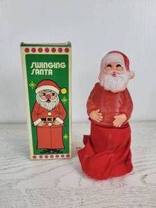 lot 1137 image: Swinging Santa Novelty Toy