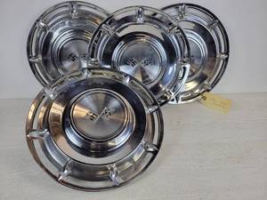 lot 1140 image: Set of (4) 1960 Chevy Impala Hubcaps