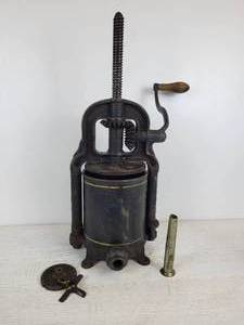 lot 1150 image: Antique National Specialty Manufacturing Cast Iron Sausage StufferFruit Press