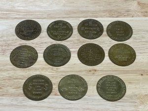 11 Brass Tokens