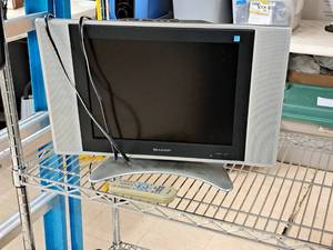 lot 24 image: Sharp 15 LCD TV with Remote Control