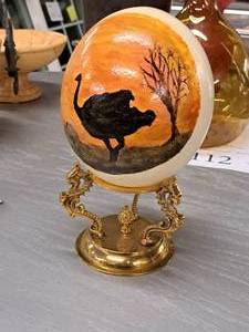 lot 114 image: 8-12 Ostrich Egg theme Home Dcor with Stand