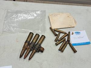 lot 146 image: Lot of  Vintage 33-cal Military Ammo and Casings