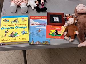 lot 161 image: Lot of (7) Curious George Book and Plush Toy Collection