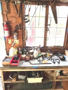 lot 17 image: Barn Wall Tool Lot #2 - Hatchets, Hammers, Saws, Spray Nozzles, Brass Hammer, Sockets, and More