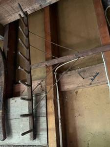 lot 26 image: Antique Wooden Shaker Style Rake, Machete, and Saw