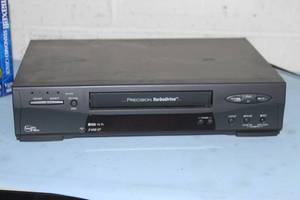 lot 95 image: Mitsubishi HS-U778 VHS Videocassette Player & Recorder VCR with New Blank Cassettes & STAR WARS Trilogy Videos