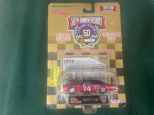 lot 27 image: Celebrate Nascar with a Dale Jr T-shirt and Two 50th Anniversary Diecast Cars