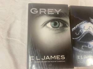 lot 30 image: Fifty Shades of Grey Complete Book Series