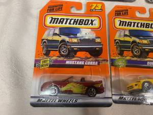 lot 64 image: Five Matchbox Cars New in box