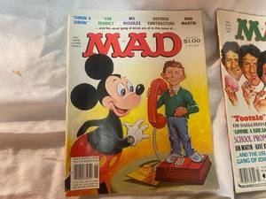 lot 90 image: Eight Vintage Mad Magazines