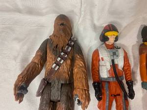 lot 100 image: Star Wars Action Figures - Chewbacca 14, Rebel Figure 12 and Ezra Bridger 10