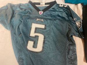 lot 105 image: Three Youth Pro Football Jerseys - Eagles, Jaguars, Bills