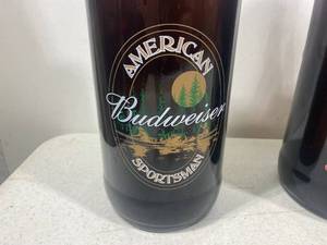 lot 109 image: Budweiser Big Bottles - 2 Holiday, 1 Sportsman