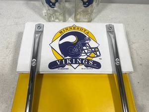 lot 136 image: Vintage Vikings Stadium Seat with 2 Glass Viking Mugs