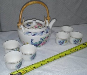lot 249 image: Miniature Teapot Set.