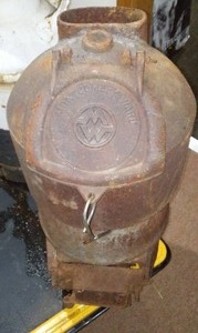lot 321 image: Cast Wood Stove..