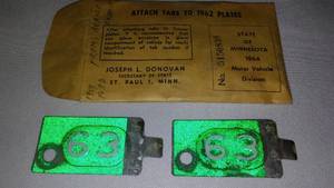 lot 342 image: Minnesota 1963 Metal License Tabs.