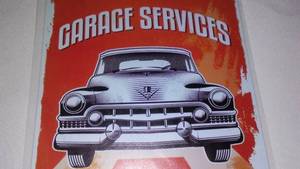 lot 417 image: Garage Services Metal Sign.