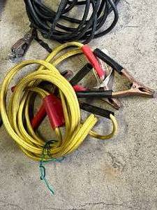lot 21 image: Jumper Cables & Muffler Part