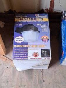 lot 252 image: Lights Of America Fluorescent Yard Light (New in Box)