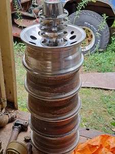 lot 162 image: Lot of (5) 15 5-6.5 Bolt Pattern Ford Wheels with Center Caps