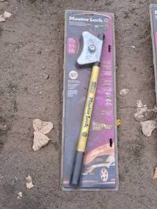 lot 215 image: Master Lock Steering Wheel Lock (New)