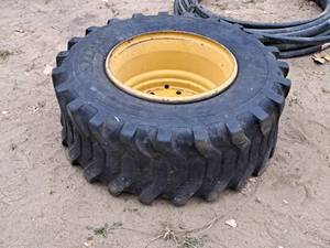 lot 219 image: Titan 12-16.5NHS Skid Steer Loader Tire on Rim