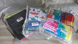 lot 157 image: NEW Assorted Packages of Neck Gators