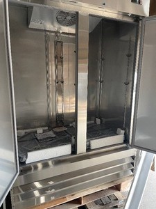 lot 52 image: Norpole NP2F 54.00 Two Section Solid Door Reach-In Freezer and like new working conditions LOW RESERVE OF $1650.00 retail are $3300