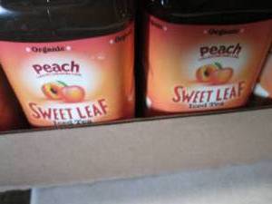 lot 464 image: 8- 64 oz bottles Peach Seet Leaf Ic...