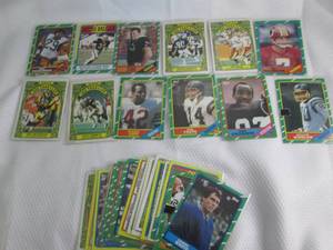 lot 147 image: Assorted 1986 Topps Football Cards...