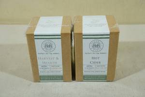 lot 82 image: 2 12oz Begonia and Bench Candles -Harvest & Hearth, Hot Cider