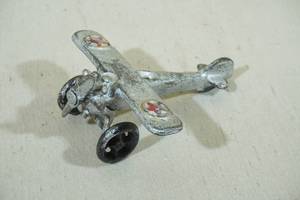 lot 132 image: Vintage Cast Metal Toy Airplane