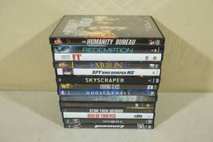 lot 214 image: Assorted DVDs -Furious 7, The Mummy, Spy who Dumped Me, Merlin