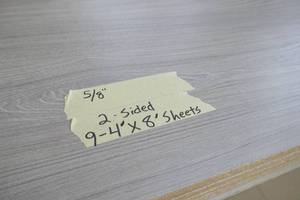 lot 22 image: Nine 4x8 sheets of 58 Driftwood (light grey) Melamine