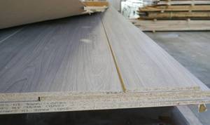 lot 28 image: Four full 4x8 sheets and 2 ripped of 58 Driftwood (light grey) Melamine
