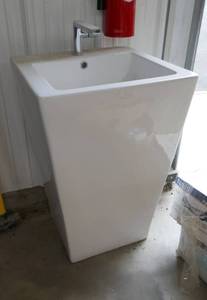 lot 39 image: New Sink with faucet and drain
