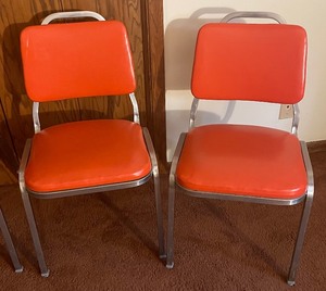 lot 54 image: Set of Four Vintage Chrome Chairs with Orange Vinyl Seats and Backs