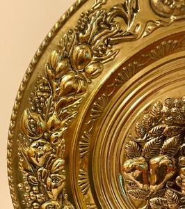 lot 73 image: Golden Brass Circular Embossed Wall Hanging